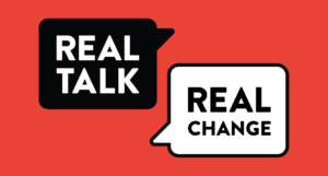 Real Talk for Real Change logo, orange background with black and white conversation balloons